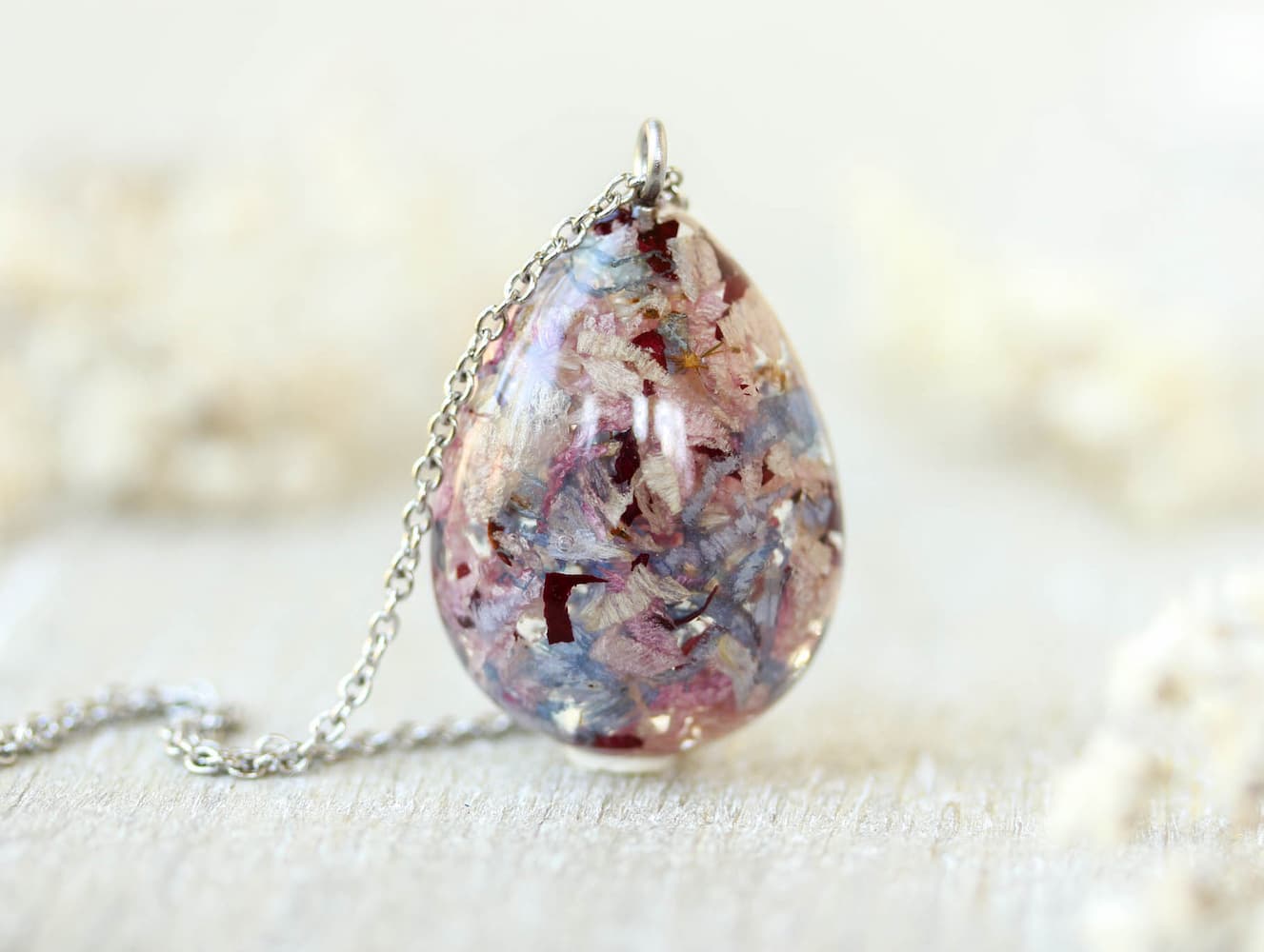 Teardrop necklace with preserved funeral flowers in resin, handmade memorial keepsake jewelry