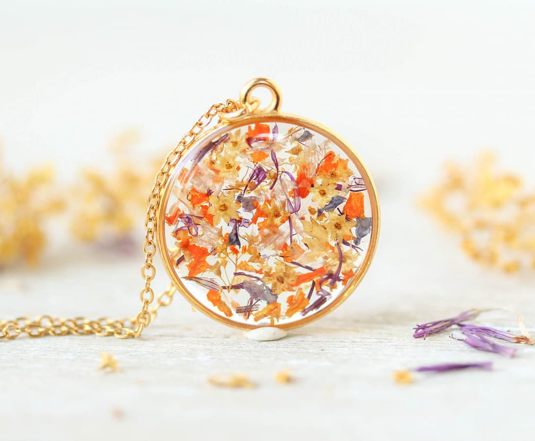 Handmade round necklace with preserved wedding bouquet flowers in resin, custom keepsake jewelry